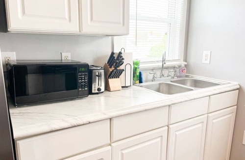 Piqua Condo | Stylish 2-Bedroom duplex in prime location!