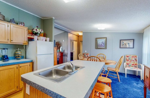 Alvin House | Sunny Acreage - Prime Location Home with Beautiful Yard & Recent Renovations
