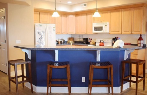 Chincoteague Condo | Sunset Bay Villa #210- Waterfront Condo in Town, Pool, Gym
