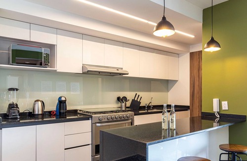 Hipodromo Condesa Apartment | Taman by Kukun Summar