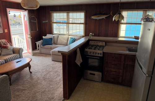 Midtown Ocean City Cottage | This Beach cottage is close to everything and just steps from the Beach !