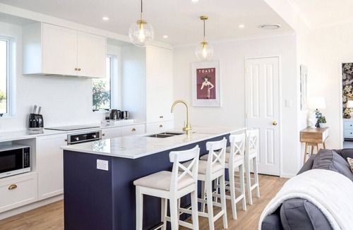 Martinborough Apartment | Three on Wilson | Modern 4BR, Seasonal Communal Pool Access & Walk to Town