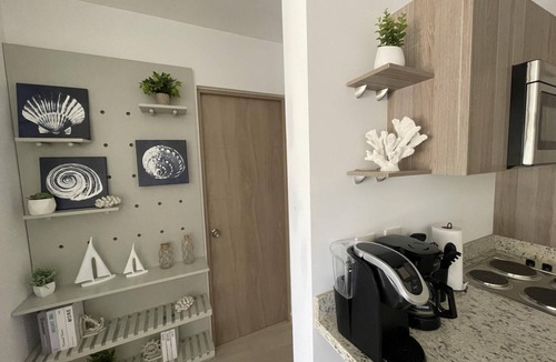 Cerritos Condo | Tropical Condo - Close to Beach and Waterpark!