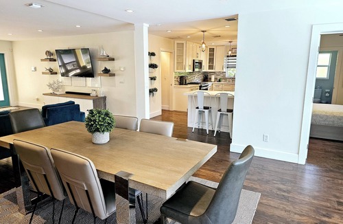 Garden Isles House | Tropical Luxury Living, waterfront, pool heated, close to the beach