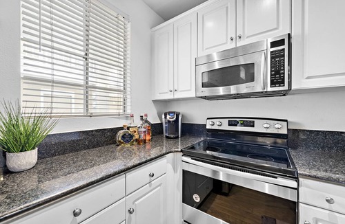 Huntington Beach Condo | Turnkey Surf Designer, furnished Condo with amazing Amenities!
