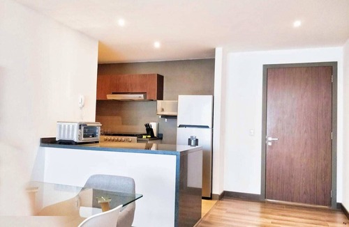 Anahuac Apartment | Two Beautiful 1 BR apts, 2 floors apart HS WiFi, full amenities!
