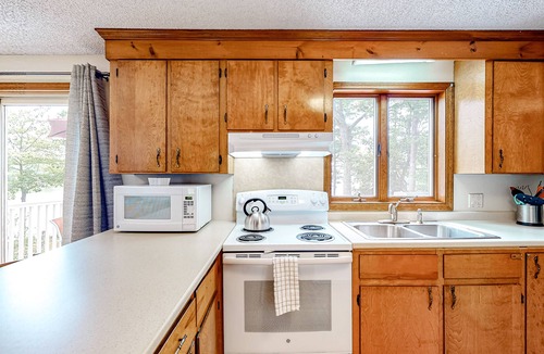 South China House | Two-story lakefront home with a seasonal dock, furnished deck, & washer/dryer