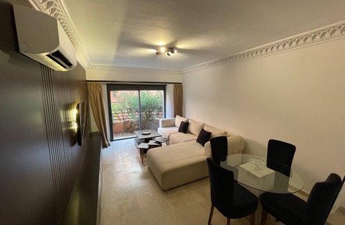 Hivernage Apartment | Urban oasis at l'Hivernage: Pool & Garden