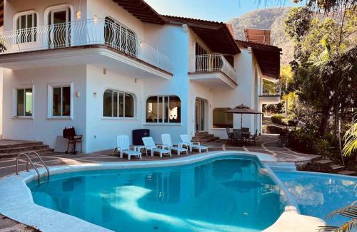 South Shore Hotel Area Villa | Villa Martha Garza Blanca - Heated Pool, Chef & Full Staff Included