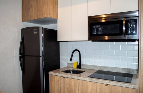 Cerritos Apartment | Vista de playa y alberca de lujo