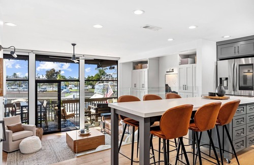 Harbor Condo | Waterfront Marina Retreat - Parking + Workspaces + Large Balcony with Six Pools