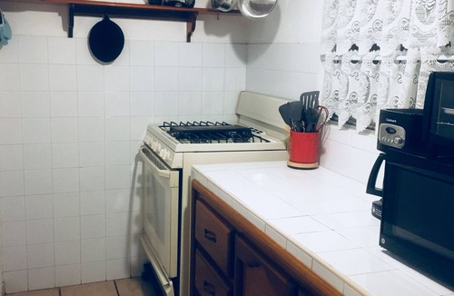 Las Gaviotas Condo | Wonderful bungalow in private tennis club located a block from Malecon and beach