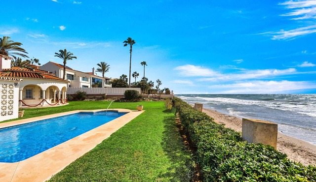 1100 Stunning Marbesa Beachfront Villa with Garden Pool