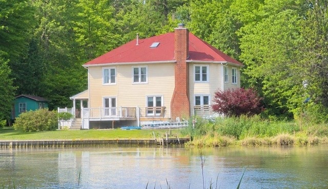 5-bedroom waterfront home on 1.5 acres in Stevensville with tons of parking