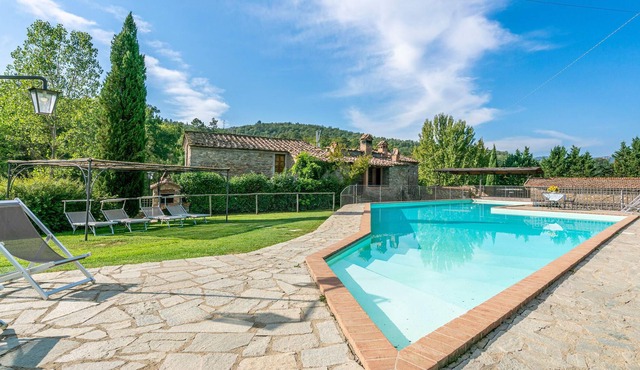 About 1 km from Badia Agnano, this ancient stone property, composed of an ancient and a new mill, aw