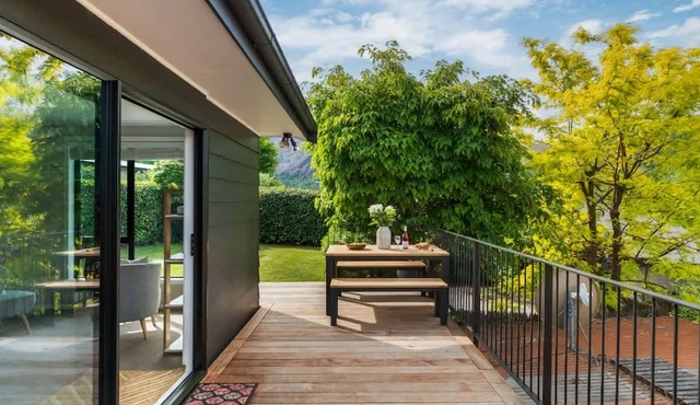 Arrowtown Charm is a cosy retreat blending rustic character and modern comfort in the heart of town.