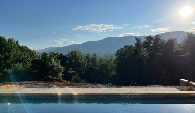 Breathtaking views of Shenandoah National Park with heated pool and hot tub.