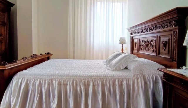 Casa Gabry, a spacious home (150 square meters) with a balcony, parking, and AC
