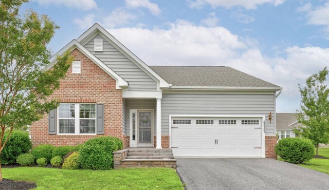 Convenient Lewes location with fenced yard, game room and huge community pool!