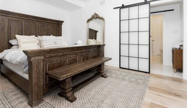 Farmhouse chic on Georgian Bluffs, where luxury meets comfort.