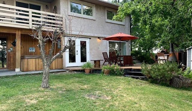 Incredible Waterfront Cottage with Hot-tub, Barbecue and Fire Pit in Portage la Prairie, Manitoba