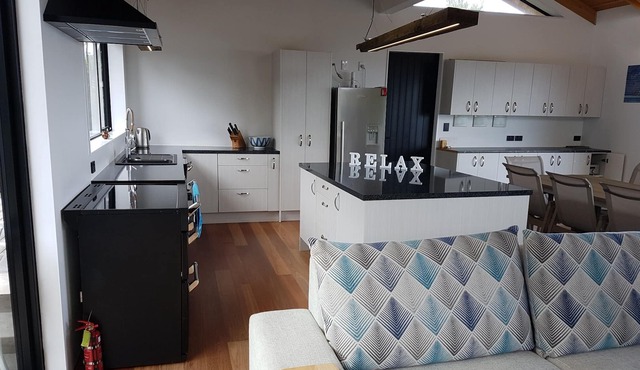 Kitchen and entertainment area with views and 3 pods for sleeping all separate