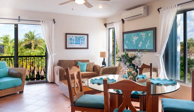 Large modern 3rd floor apartment, fresh breeze, huge deck overlooking pool