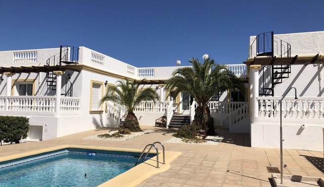 Large private property comprising 4 separate units with private swimming pool