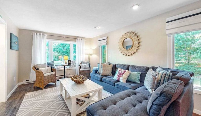 Modern home in a great location with large yard & private patio