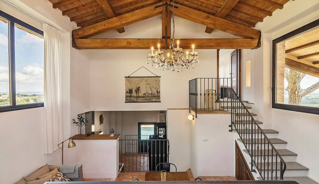 Restored barn in San Gimignano hills view