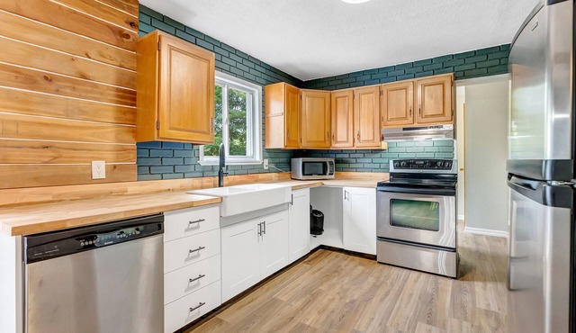 Steps from South Lake, on 9 acres surrounded by Haliburton highlands.