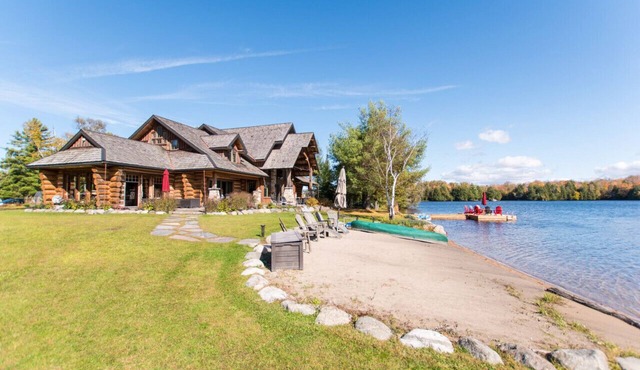 Stunning Log Cabin on 123 Acres