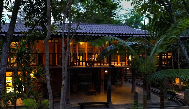 Unique Thai stilt, wooden house near famous Black House Museum