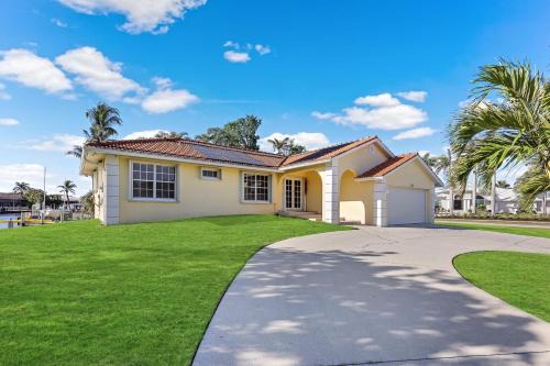 Pet-friendly waterfront with pool and steps to beach