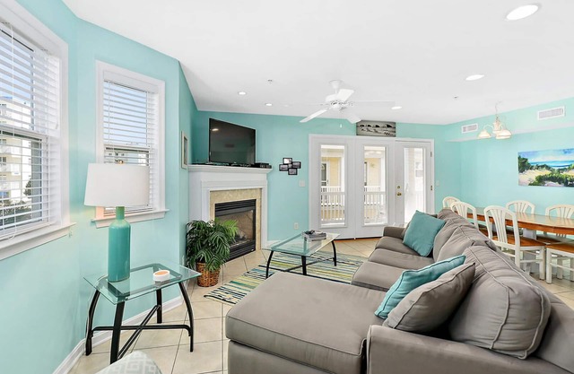 Stylish, upscale 3 bedroom condo with a television in every bedroom and living room, free WiFi, and two floors located downtown only a few streets from the boardwalk and only steps to the beach!