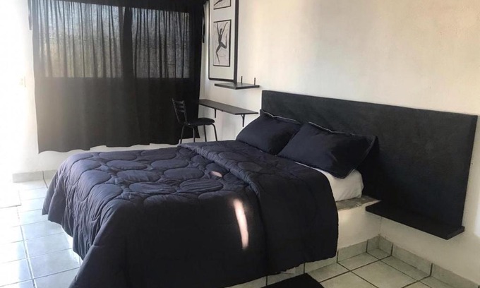 Downtown Cabo San Lucas Apartment | Cozy Black and White Studio
