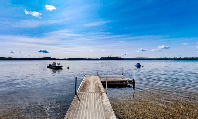 Ellsworth Cabin | Dog-friendly beach home on Green Lake with views, fireplace, dock, canoe & kayak