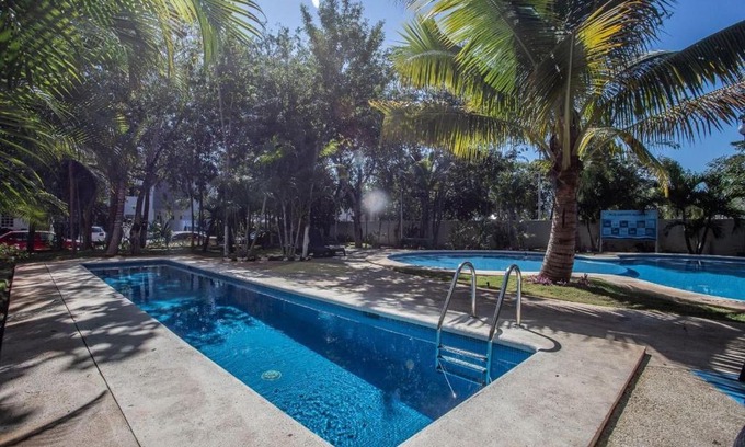 Puerto Juarez House | La Casa del Mexicano terraza y jardin exoticos 12 min del playa Esmeralda