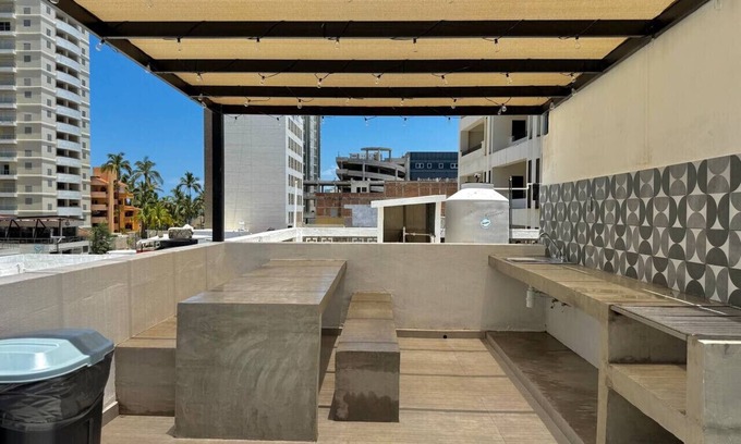 Zona Dorada Apartment | Loft Steps from the Beach By PartnerHostRentas
