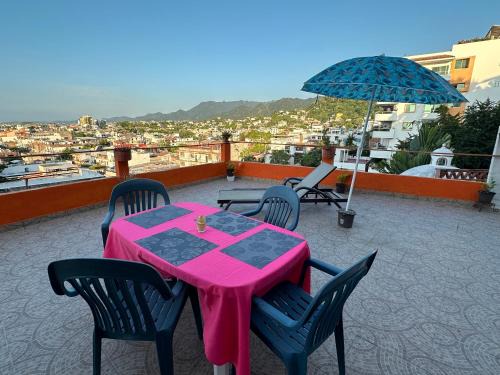 Colonia 5 de Diciembre Apartment | Orange Butterfly