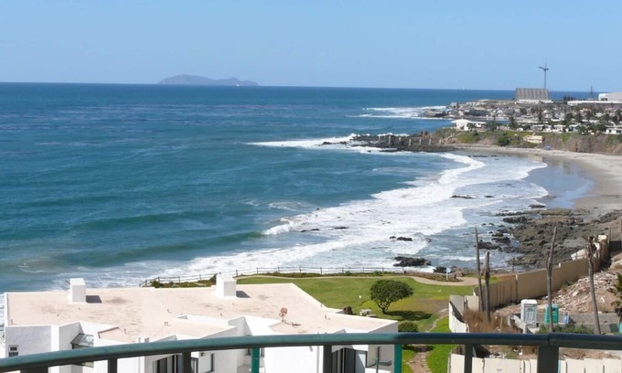 Rosarito Condo | Panoramic White Water Views from this Former Model Home