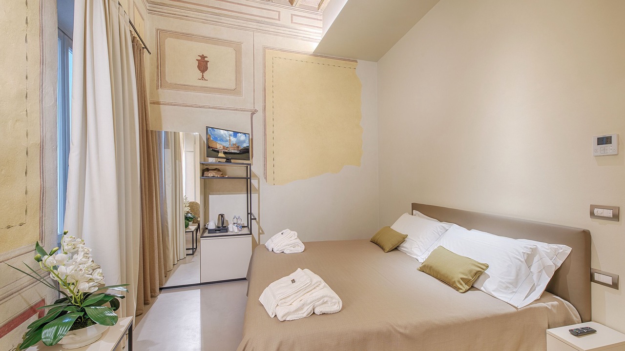 Photo of Bedroom in Siena Historical Center