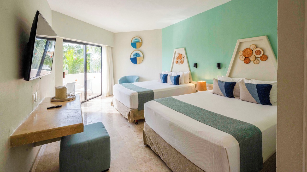 Photo of Bedroom in Playacar Zona Hotelera