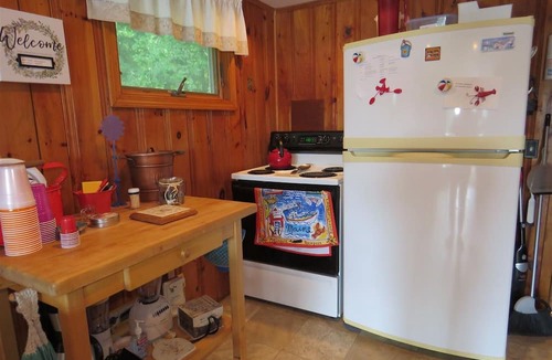 Sanford Cottage | Enchanting waterfront home offers comfort inside and out and promises enjoyment